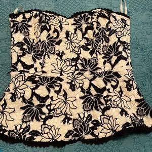 Black and white appliqué corset